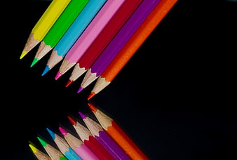 Colorful Pencils with Reflection on Black Background