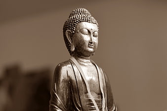 Serene Buddha Statue in Sepia Tone