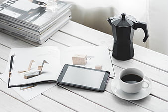 Coffee, Tablet, and Design Magazine on White Table
