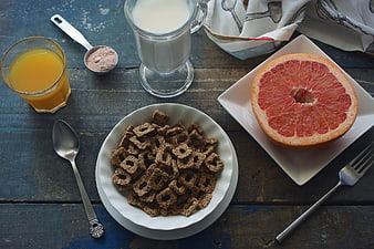 Healthy Breakfast with Cereal, Milk, and Grapefruit