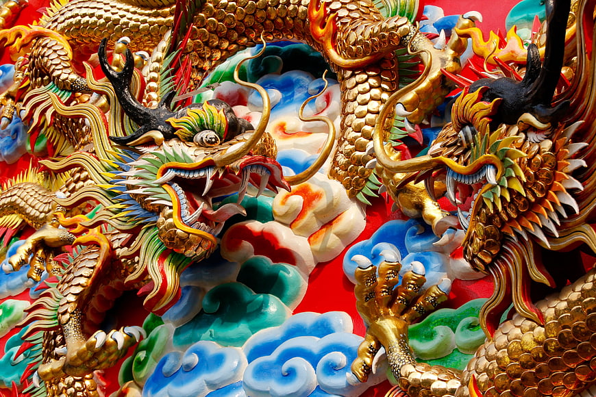 Golden Thai Dragon Sculpture on Temple Roof