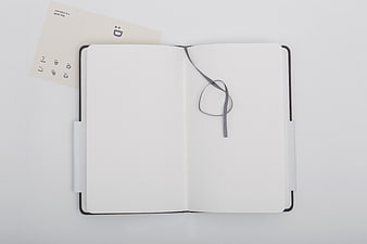 Minimalist Open Notebook with Blank Pages and Bookmark