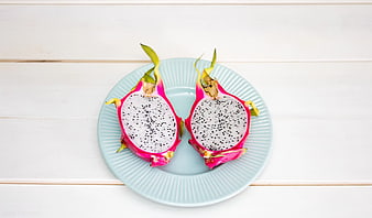 Sliced White Dragon Fruit on Light Blue Plate