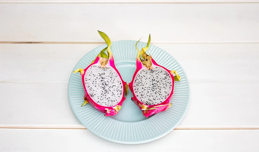 Sliced White Dragon Fruit on Light Blue Plate