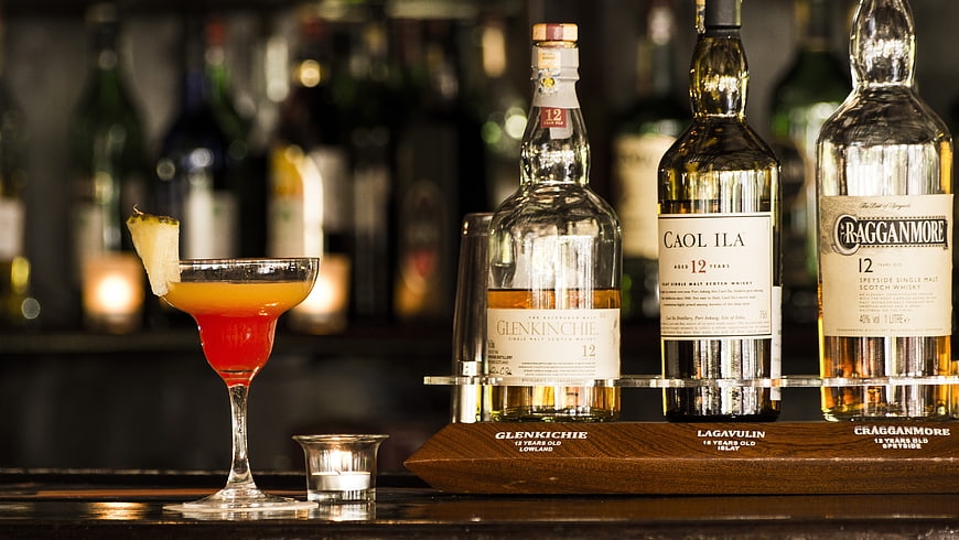 Cocktail and Scotch Whisky Flight on Bar Counter