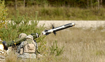Soldiers firing Javelin anti-tank missile in field