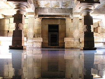 Flooded Ancient Stone Temple Interior with Reflections