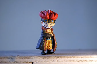 Eustass Kid Anime Figurine On Wooden Surface