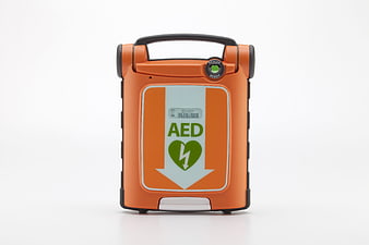 Orange AED Defibrillator on White Background