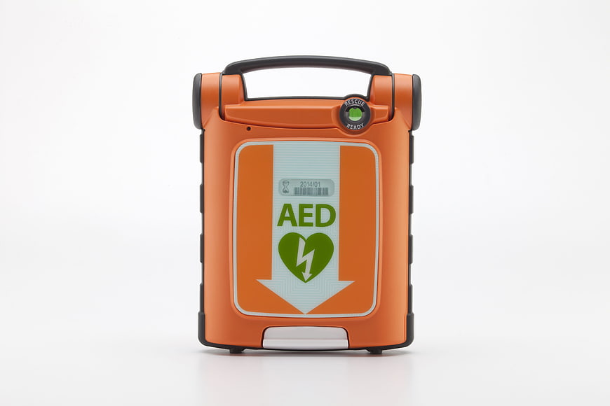 Orange AED Defibrillator on White Background
