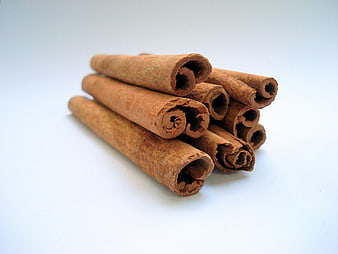 Cinnamon Sticks On White Background