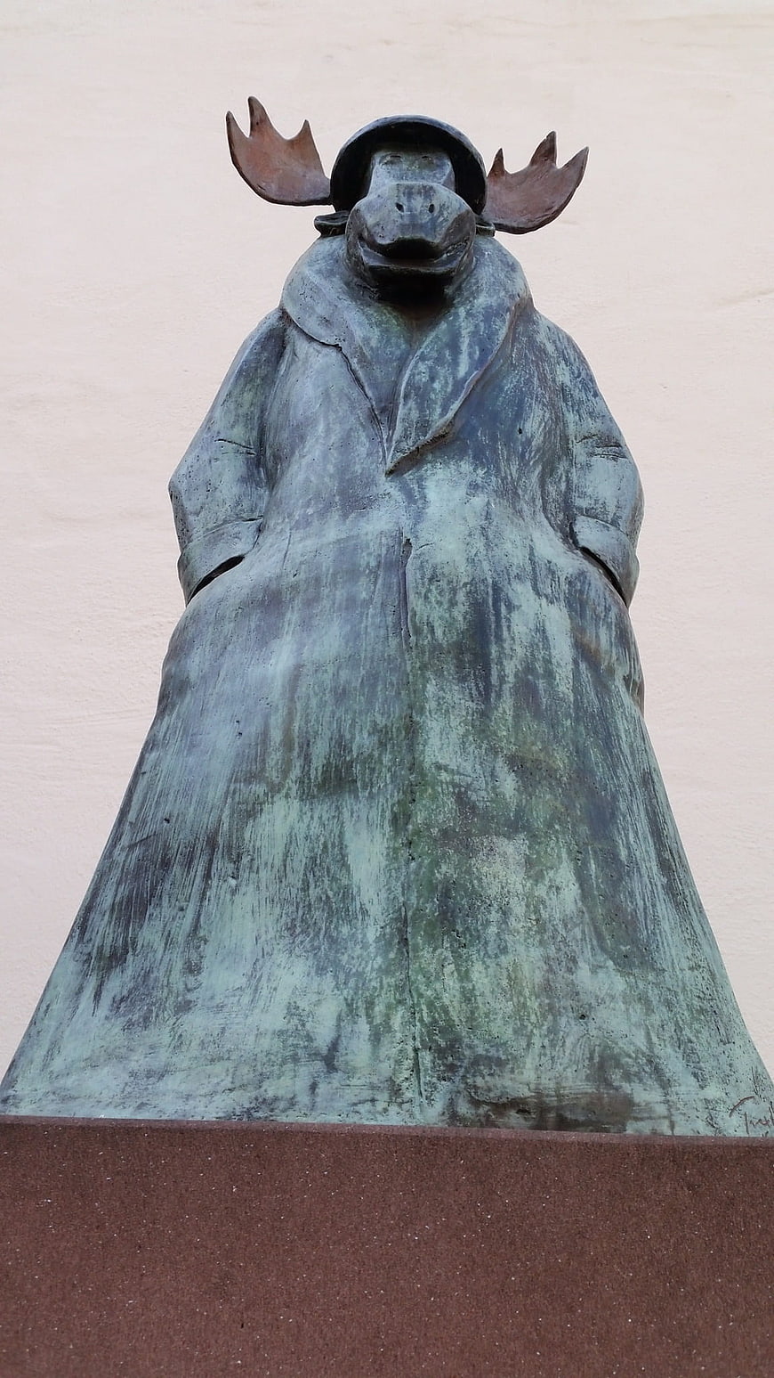 Bronze Statue of Moose in Coat and Hat