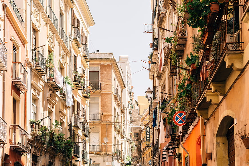 Narrow European Street with Colorful Buildings and Balconies