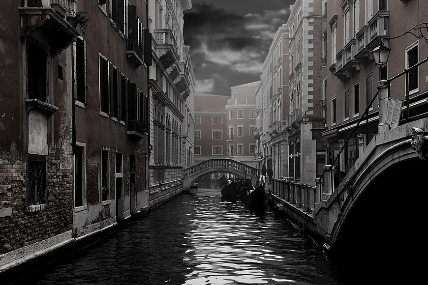 Dramatic Black and White Venice Canal with Gondolas