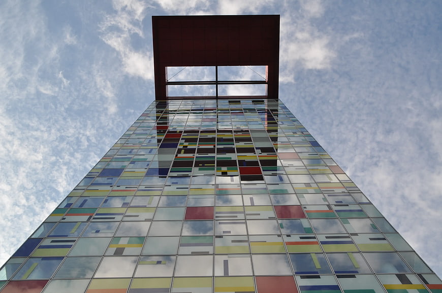 Low angle view of modern colorful glass skyscraper
