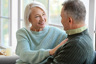 Happy Senior Couple Smiling and Laughing Indoors