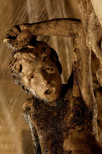 Dramatic Stone Sculpture of a Child in Distress