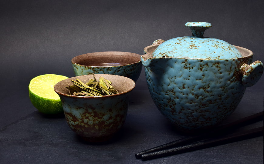 Ceramic Tea Set with Green Tea Leaves and Lime