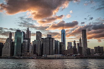 Dramatic New York City Skyline at Sunset Over the Water