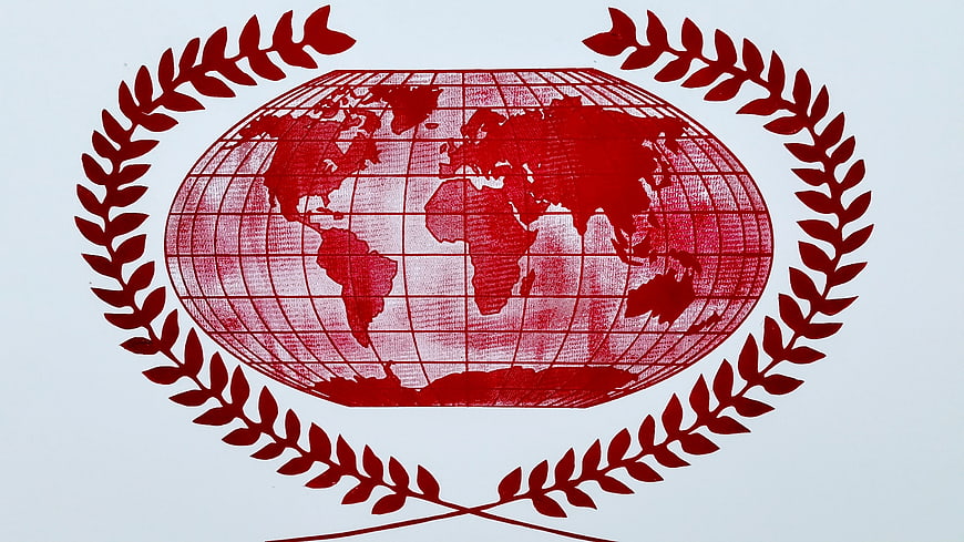 Red United Nations Emblem on White Background