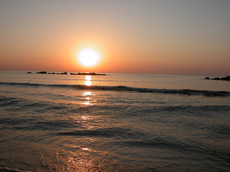 Sunrise over the Adriatic Sea with Rocky Outcrops