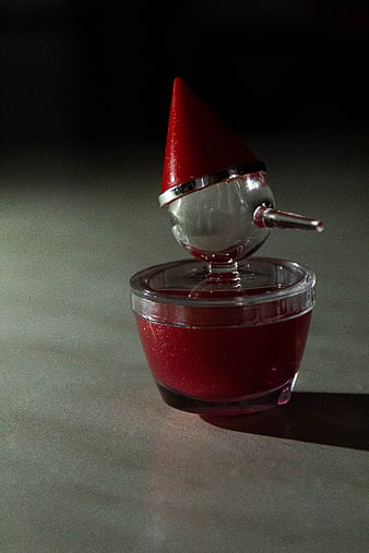Red Glitter Christmas Gnome Ornament in Clear Plastic Cup