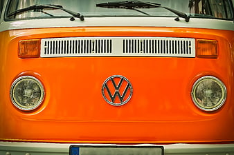 Front view of vintage orange Volkswagen camper van
