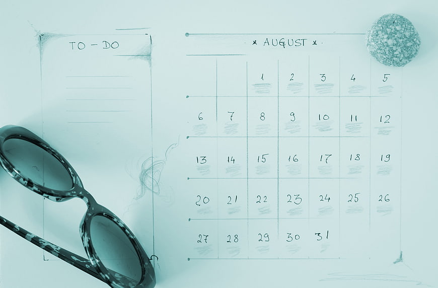 Hand-drawn August calendar and to-do list with eyeglasses on white background