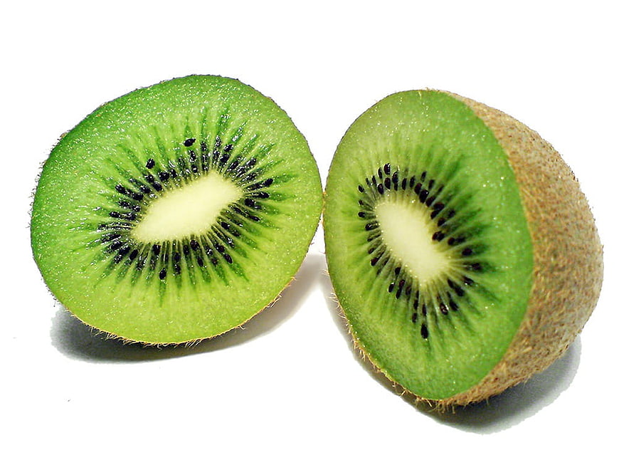 Sliced Kiwi Fruit Halves on White Background