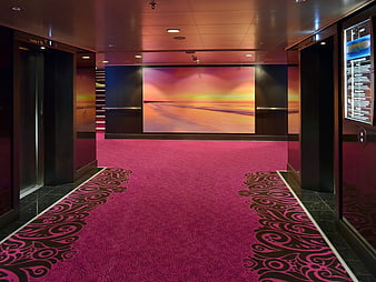 Luxury Cruise Ship Corridor With Pink Carpet And Elevators