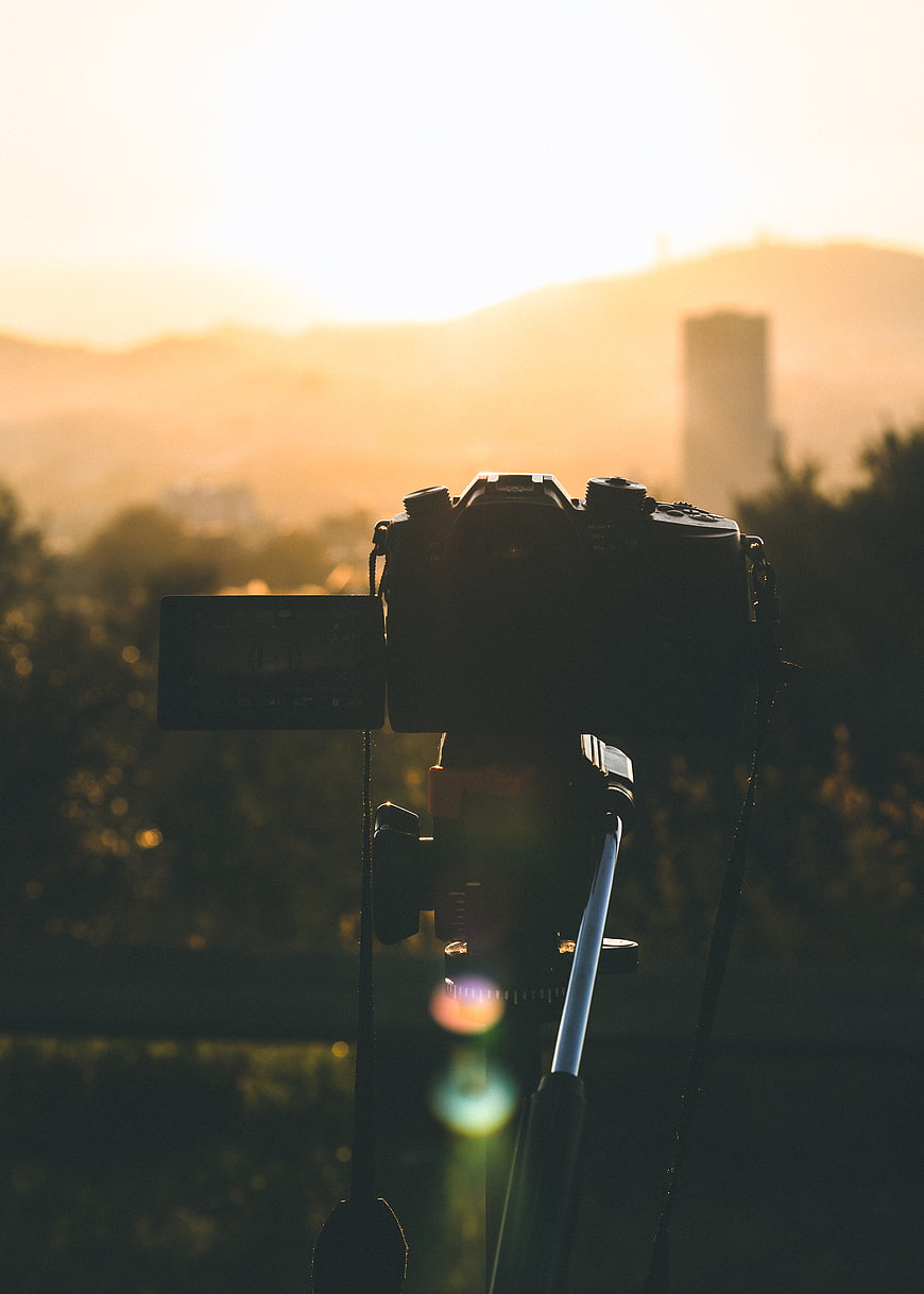 Camera on Tripod Silhouette at Golden Hour Sunset
