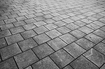 Black and white diagonal concrete pavement texture background
