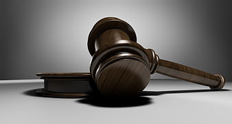 Wooden Gavel And Sound Block On Gray Background