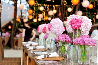 Elegant Wedding Reception Table with Pink Floral Centerpieces