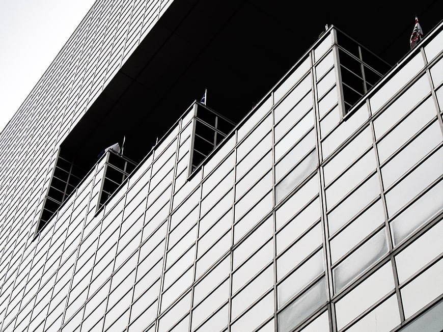 Modern Glass Office Building Facade with Diagonal Perspective