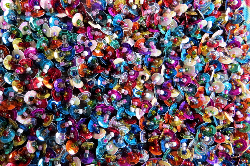 Colorful Sequins and Beads Texture Background