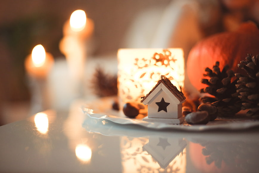 Cozy Autumn Decor with Miniature House, Pinecones, and Candles