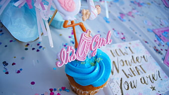 Blue Cupcake With It's A Girl Cake Topper And Confetti