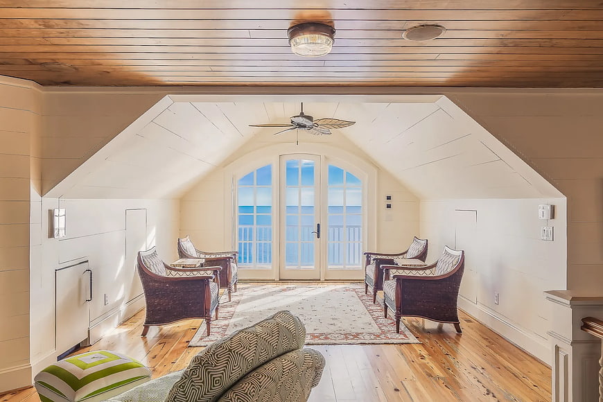Cozy Attic Room with Ocean View and Wicker Chairs