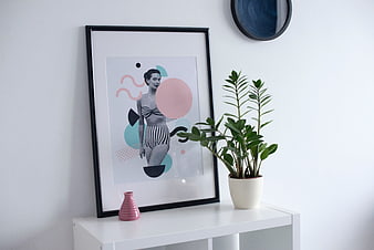 Modern Interior Decor With Framed Art Print And Potted Plant