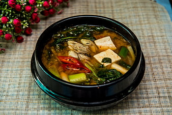 Korean Doenjang Jjigae Tofu Oyster Soup in Black Bowl