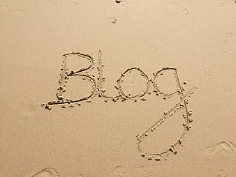 Word Blog Written in Sand on Beach