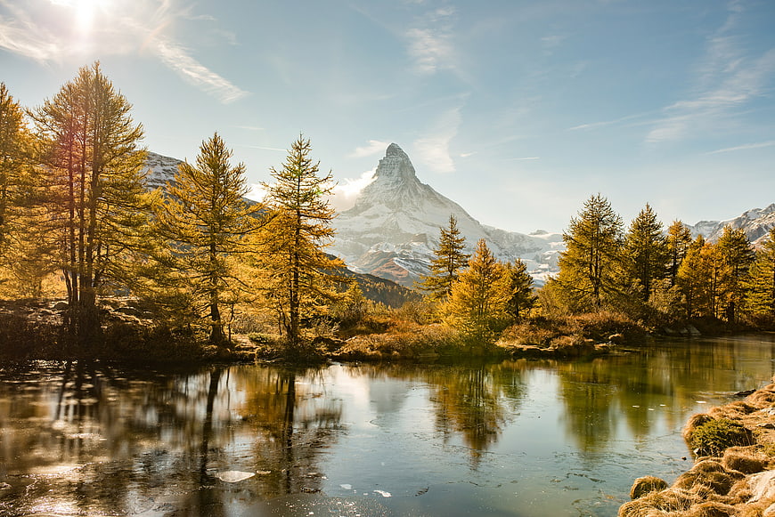 Matterhorn Reflection in Alpine Lake with Golden Autumn Trees