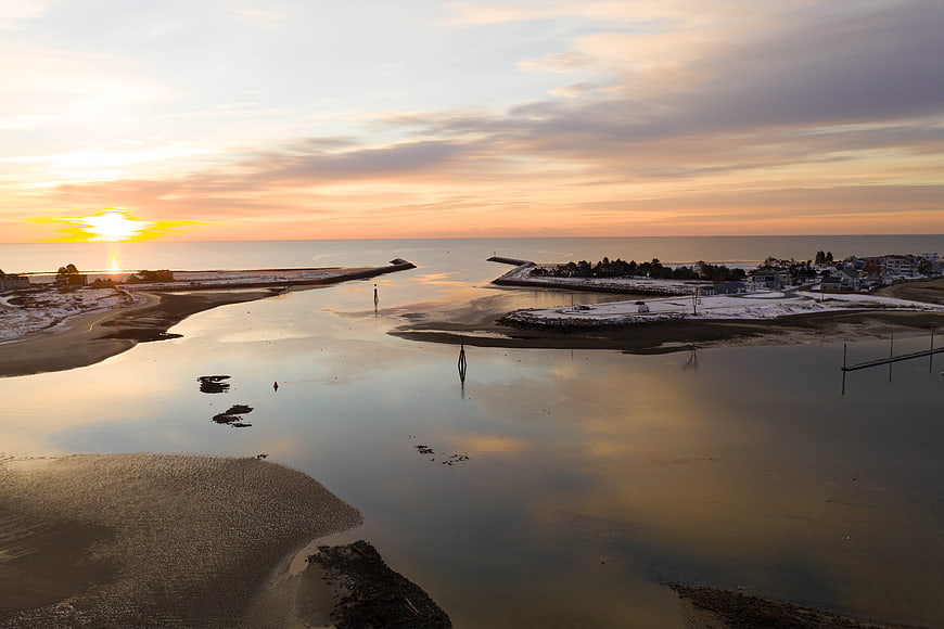 Serene Winter Sunset Over Coastal River Estuary