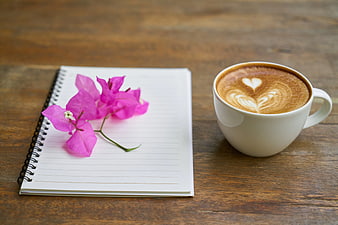 Latte with Heart Art and Notebook with Pink Flower