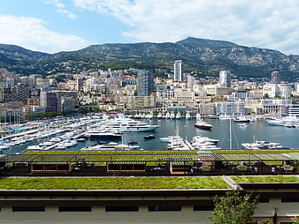 Panoramic View of Monaco Harbor with Yachts and Cityscape