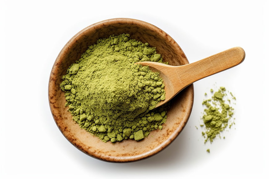 Matcha Green Tea Powder in Wooden Bowl with Spoon