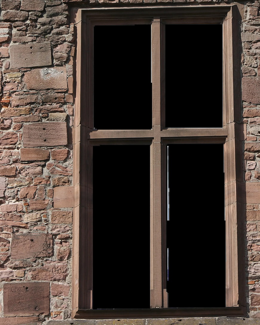 Old Stone Window Frame on Red Brick Wall
