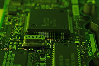 Macro View of Green Computer Circuit Board and Microchip