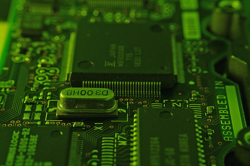 Macro View of Green Computer Circuit Board and Microchip